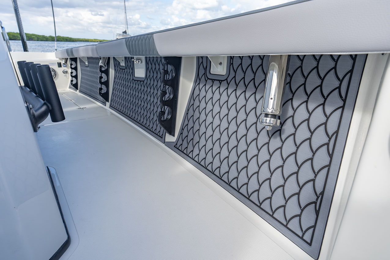 Pathfinder 2800 Hybrid under gunnel rod storage.