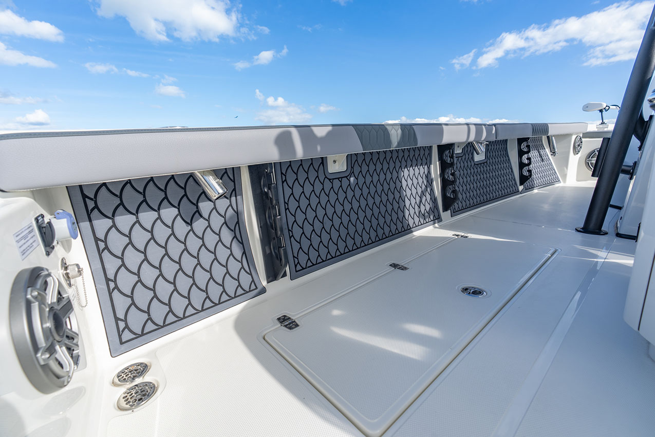 Pathfinder 2800 Hybrid under gunnel rod storage.