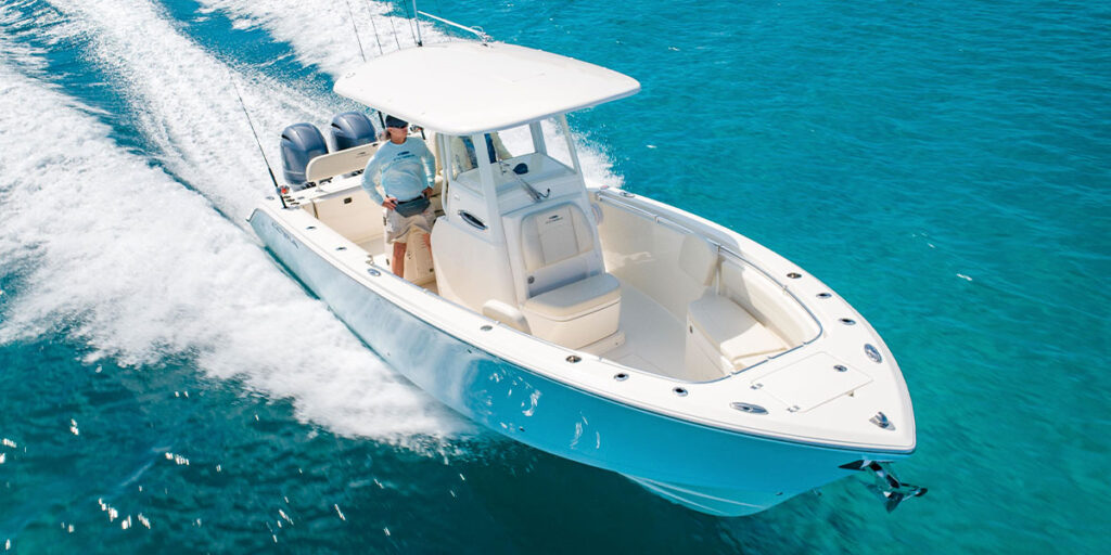 two-tone blue and white center console Cobia on the water
