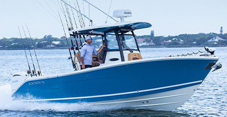 Cobia 265 Center Console Open with Yamaha Twin Engines running.