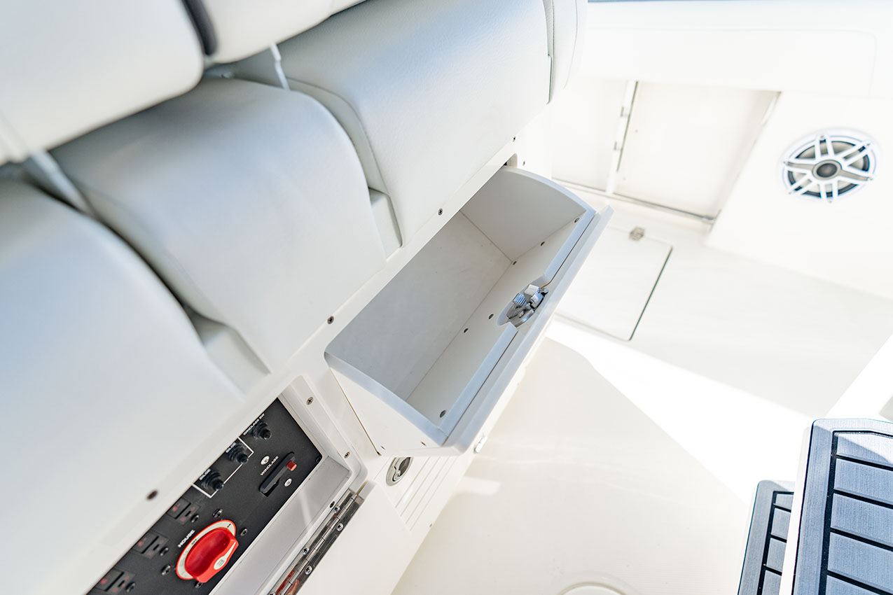 Cobia 245 CC Helm Seat Storage
