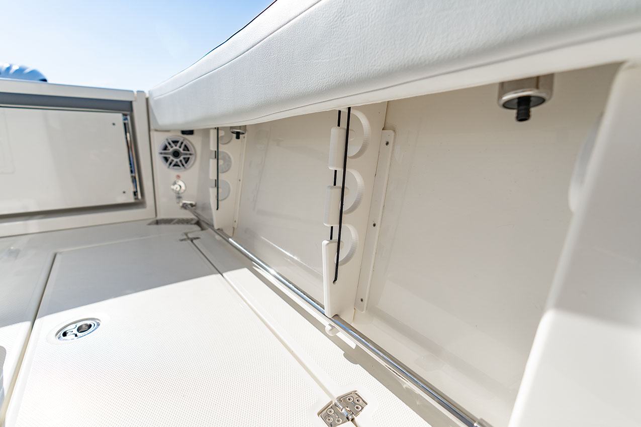 Cobia 245 CC Under Gunnel Rod Storage