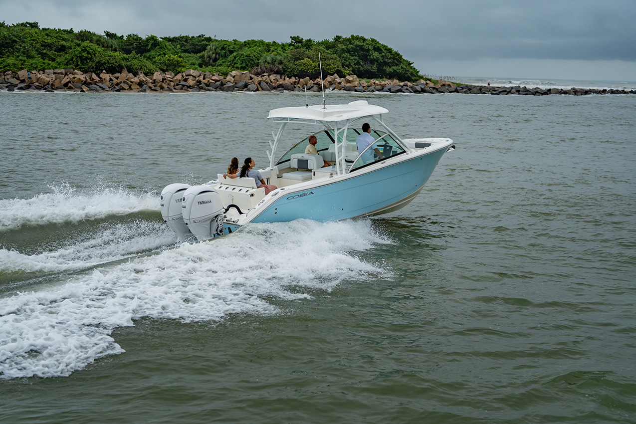 Cobia 280 DC: A versatile dual console built for offshore fishing and family comfort.