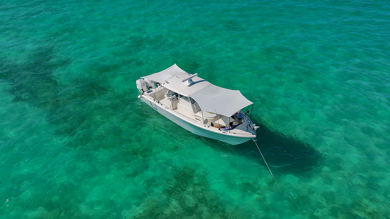 Cobia 350 CC with sunshades up from above.