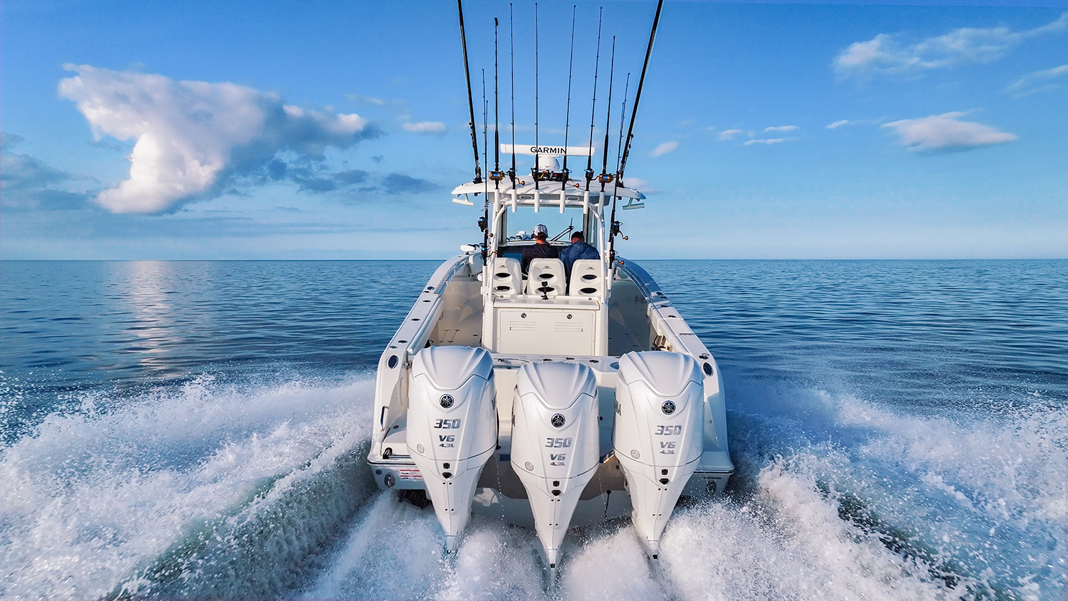 Cobia 350 CC running showing triple 350 Yamaha Outboards.